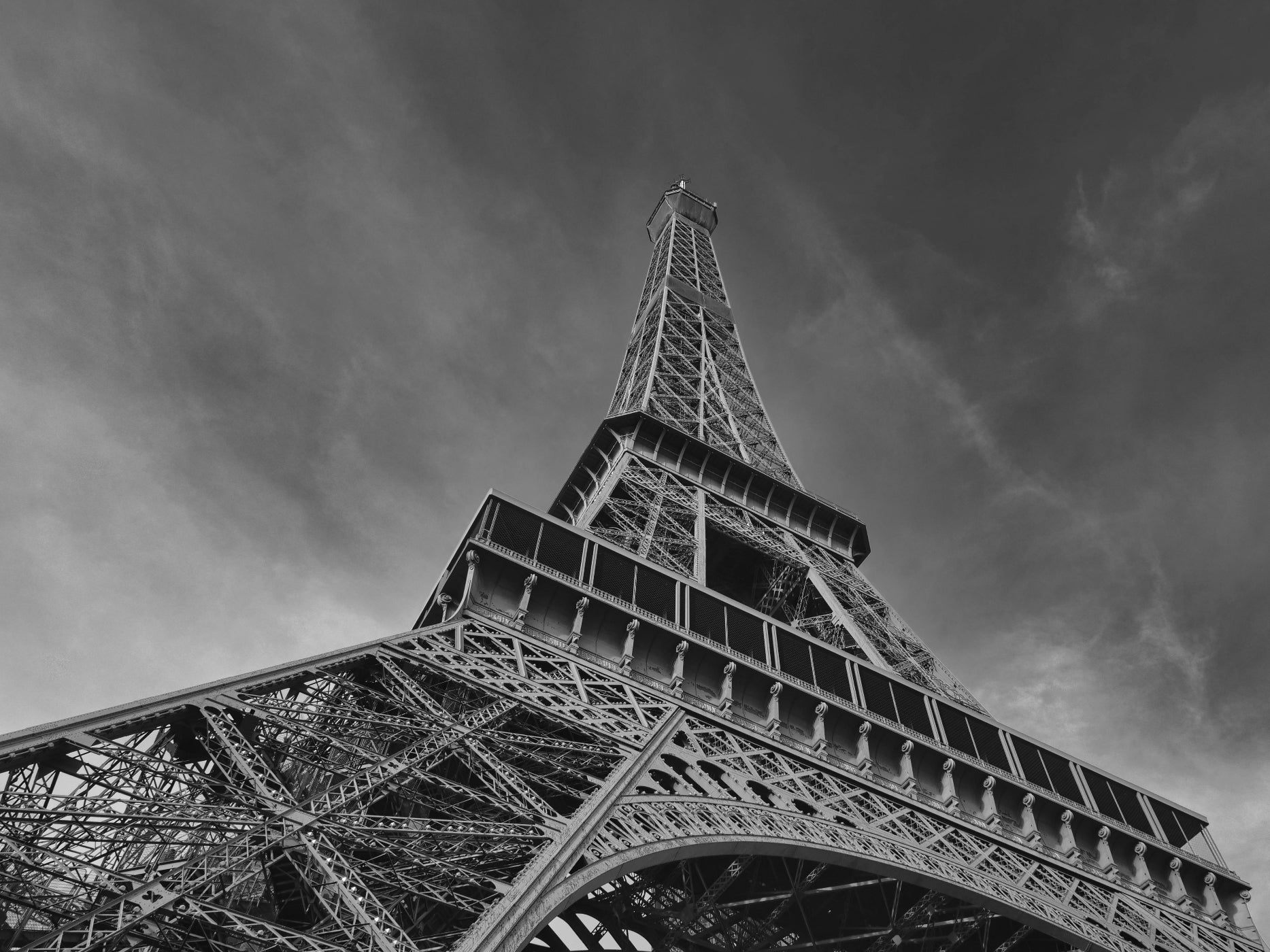Black and white low angle view of the Eiffel Tower representing French-made quality and brand commitments