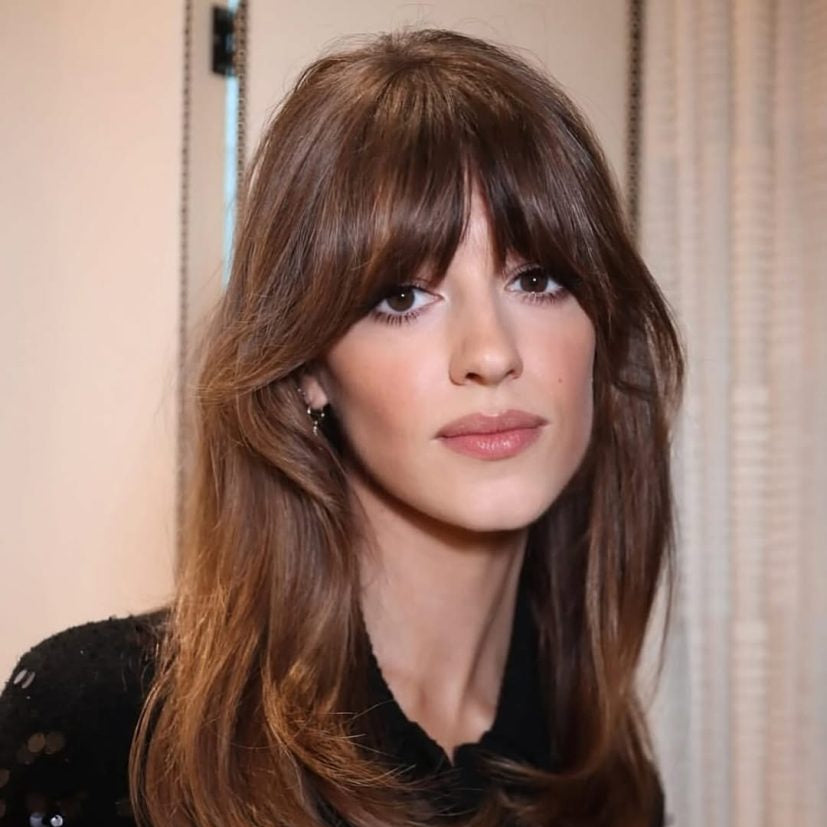 Brunette model showcasing 2026 hair trends featured in ELLE Singapore