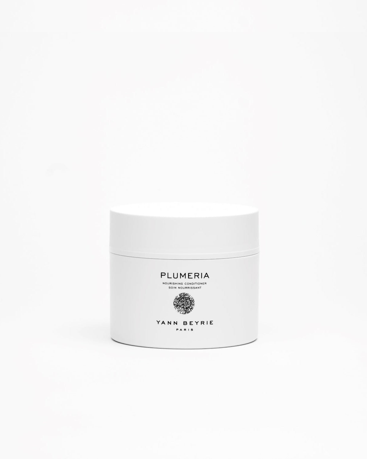 Yann Beyrie Plumeria nourishing conditioner jar on clean white background