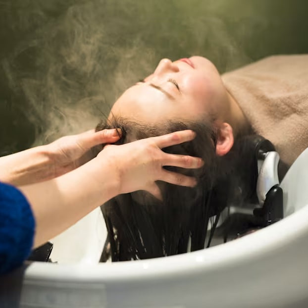 Head spa scalp treatment massage session featured in CNA Lifestyle