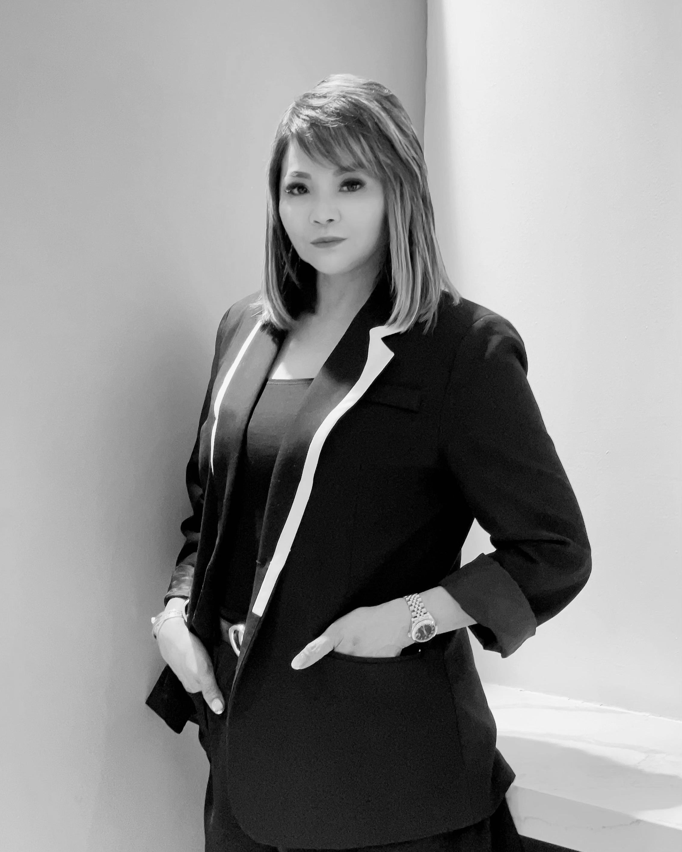 May Master Designer black and white portrait at Yann Beyrie hair salon Singapore