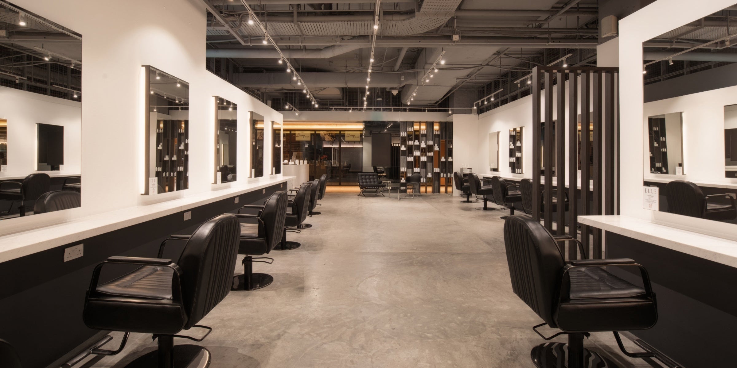 Spacious minimalist interior of Yann Beyrie Paris luxury hair salon in Singapore